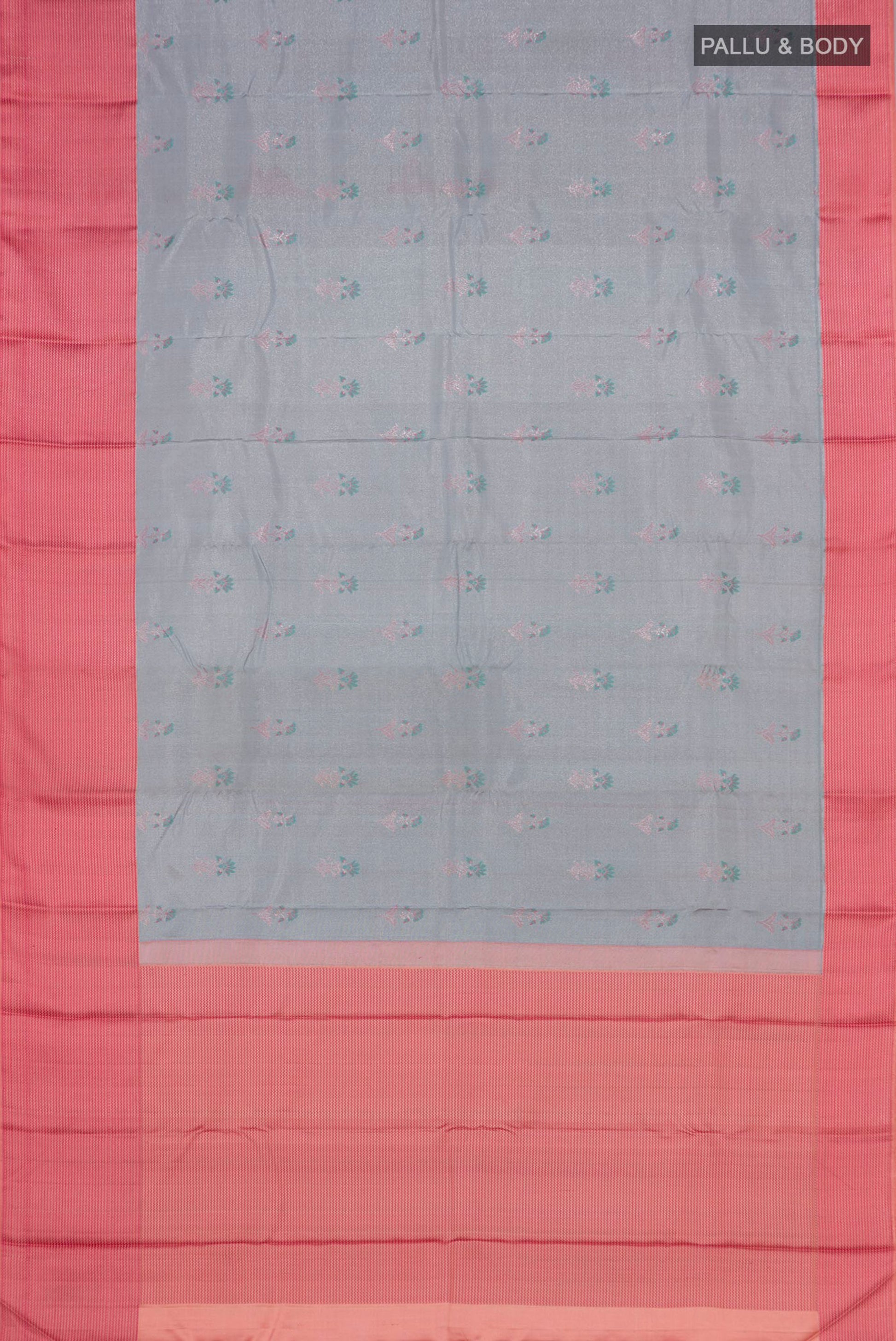 Flat view of Grey Kanchipuram Silk Saree with Zari Butta on the body and Thin Zari Line. 