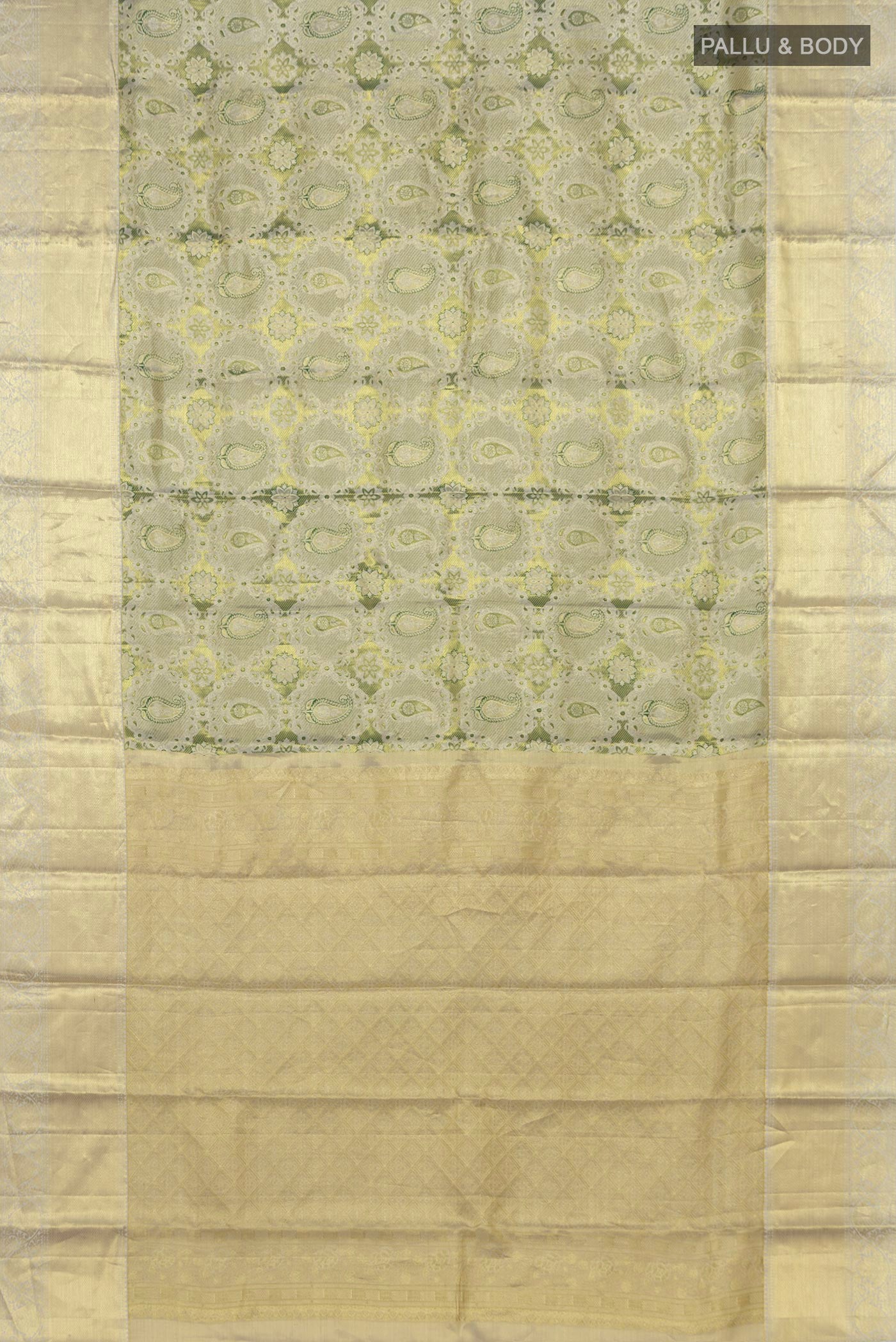 Flat view of Green Kanchipuram Saree with Zari Brocade on the body and Zari Border. 