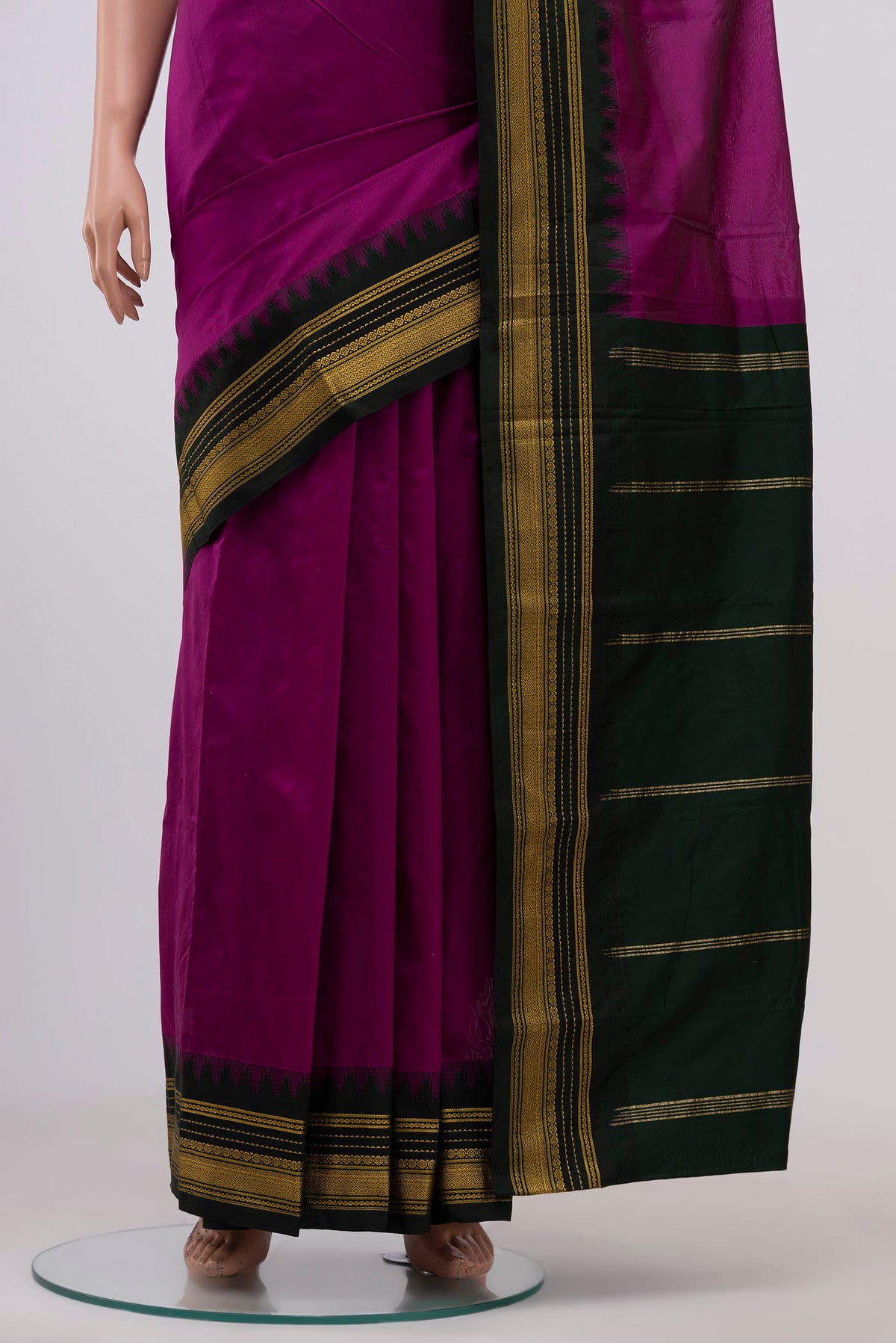 Pleats and pallu of Purple Blended Bangalore Silk Saree with Plain Body and Zari Border. 