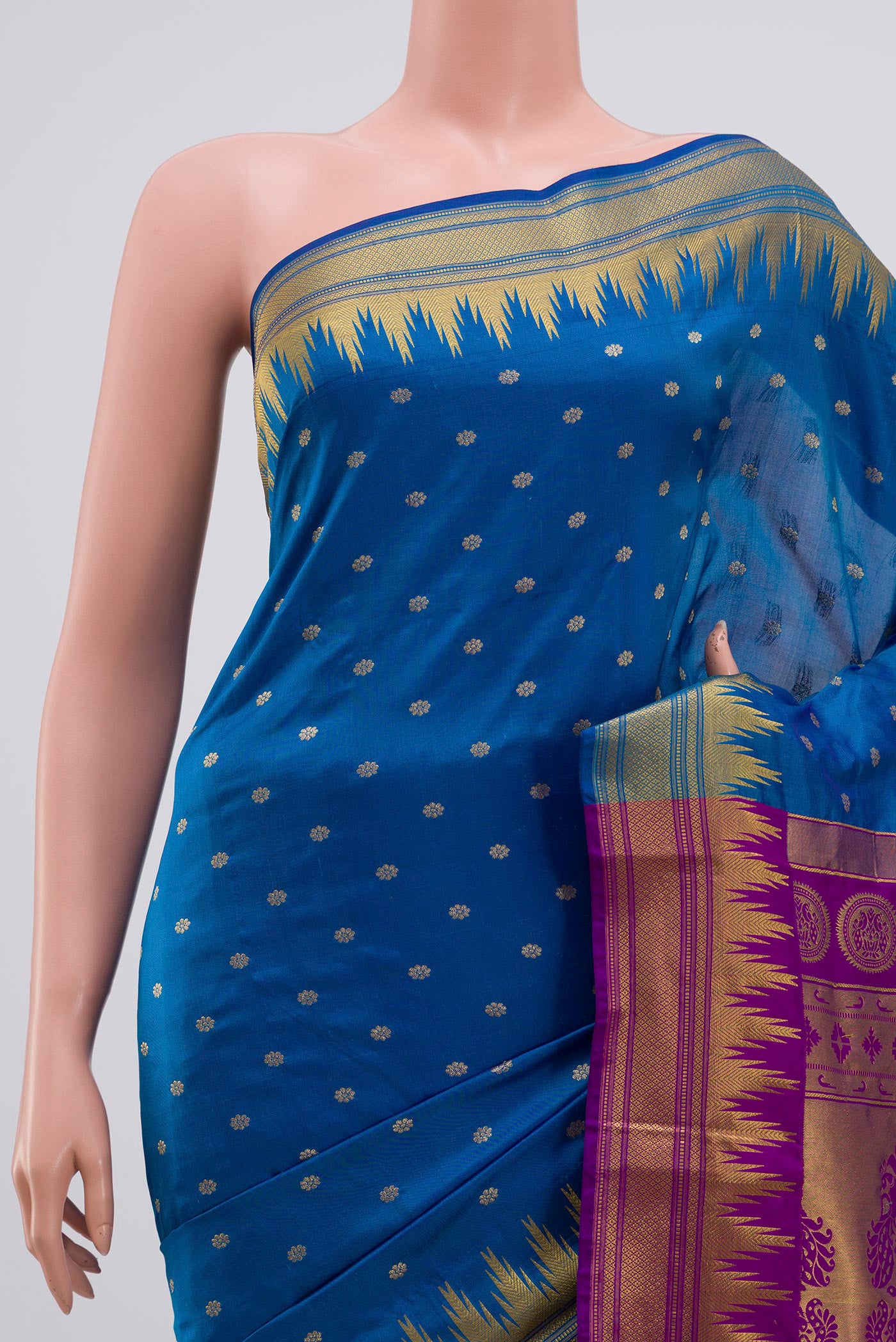 Border image of Blue Blended Bangalore Silk Saree with Zari Butta on the body and Zari Border. 