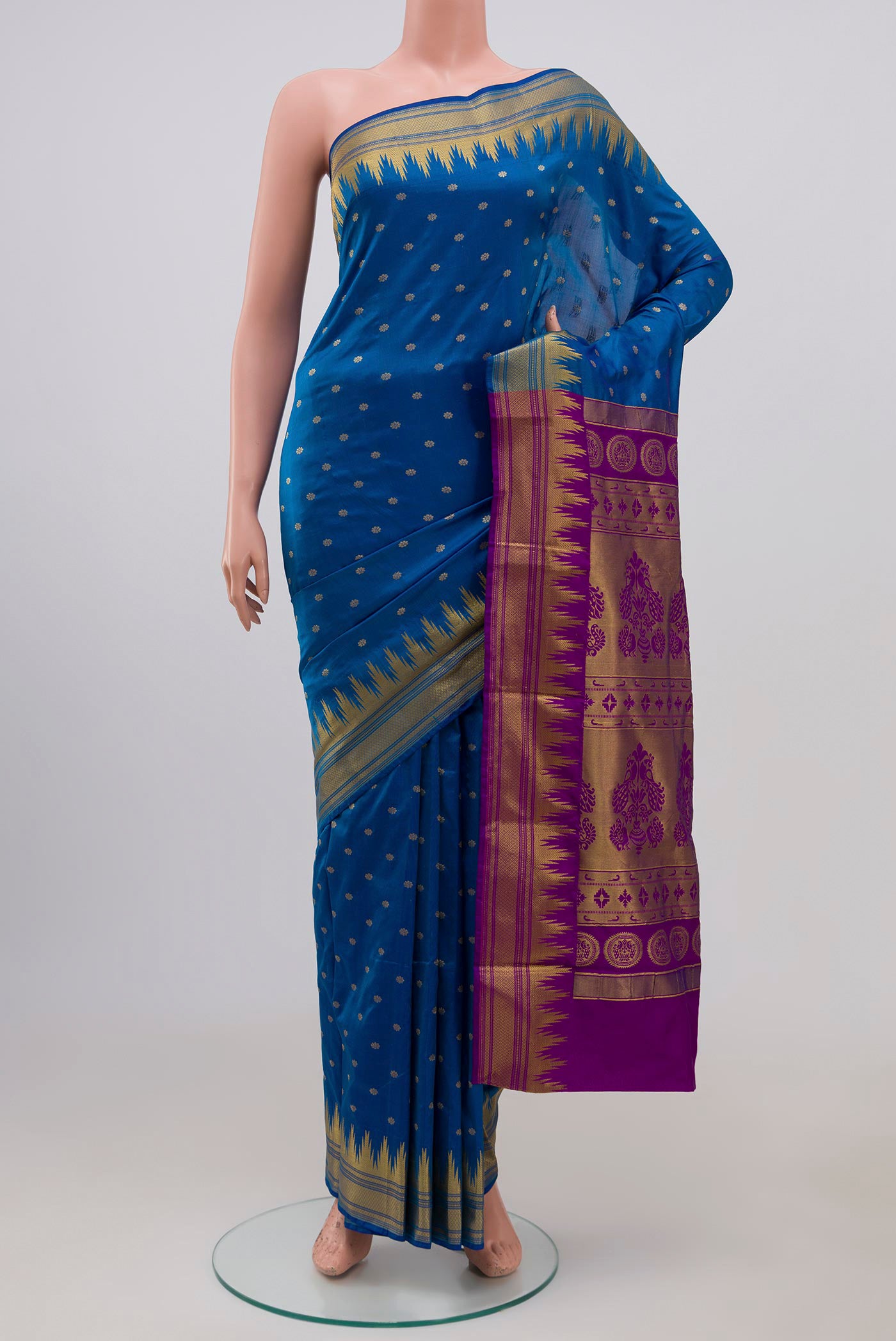 Blue Blended Bangalore Silk Saree with Zari Butta on the body and Zari Border.  displayed on a mannequin