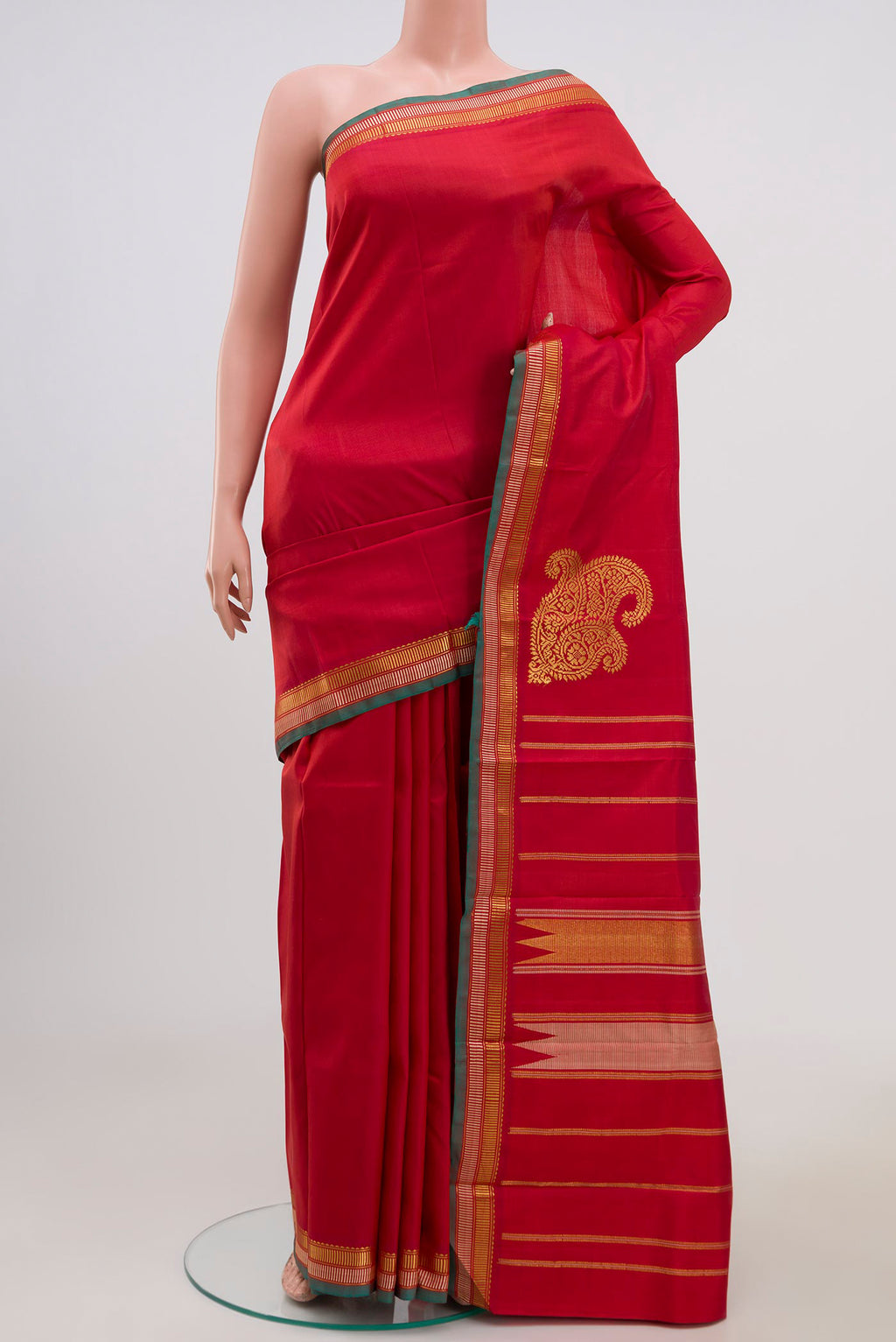Pure Silk Pure Zari Red Kanjivaram Saree with Plain Body and Zari Border.  displayed on a mannequin