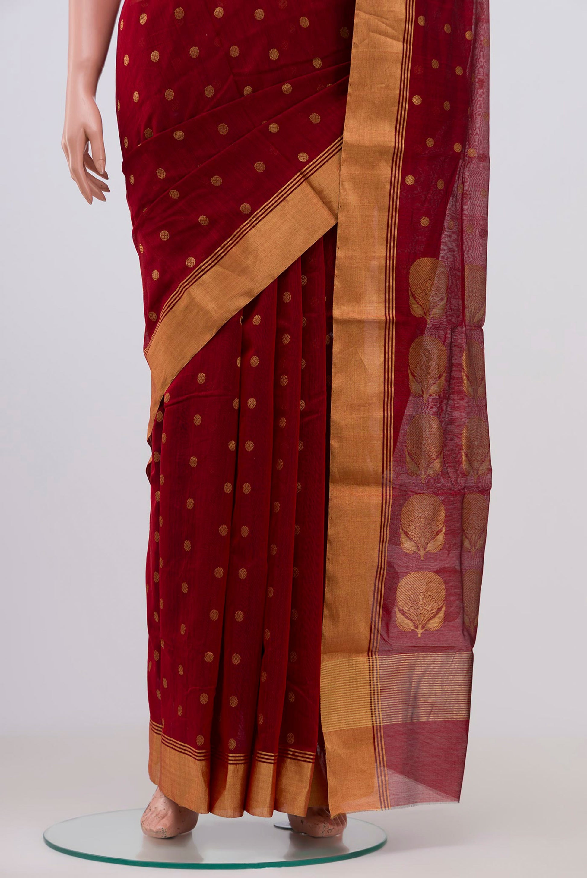 Pleats and pallu of Maroon Chanderi Silk Cotton Saree with Zari Butta on the body and Zari Border. 