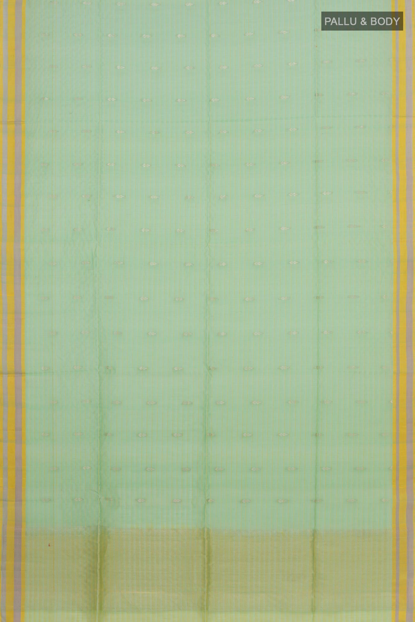 Flat view of Light Green Coimbatore Silk Cotton Saree with Zari Butta on the body and Thread Border. 