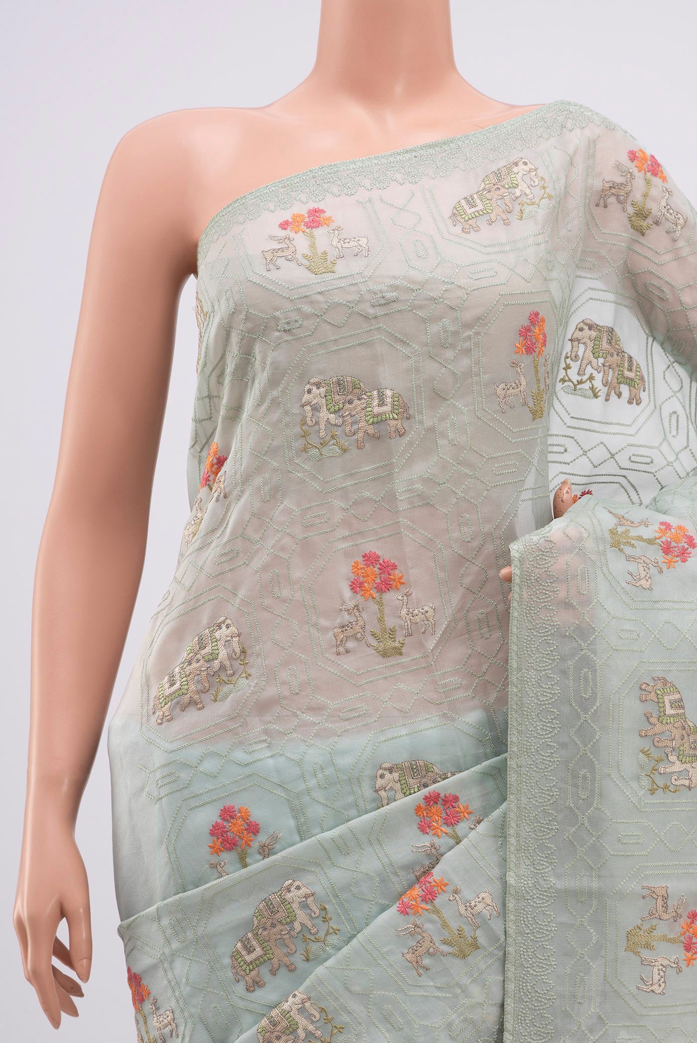 Border image of Light Blue Organza Silk Saree with Fancy on the body and Without Border. 
