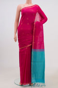 Pink Coimbatore Silk Cotton Saree with Zari Butta on the body and Thin Zari Line.  displayed on a mannequin