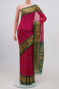 Pink Coimbatore Silk Cotton Saree with Ikat Print on the body and Zari Border.  displayed on a mannequin