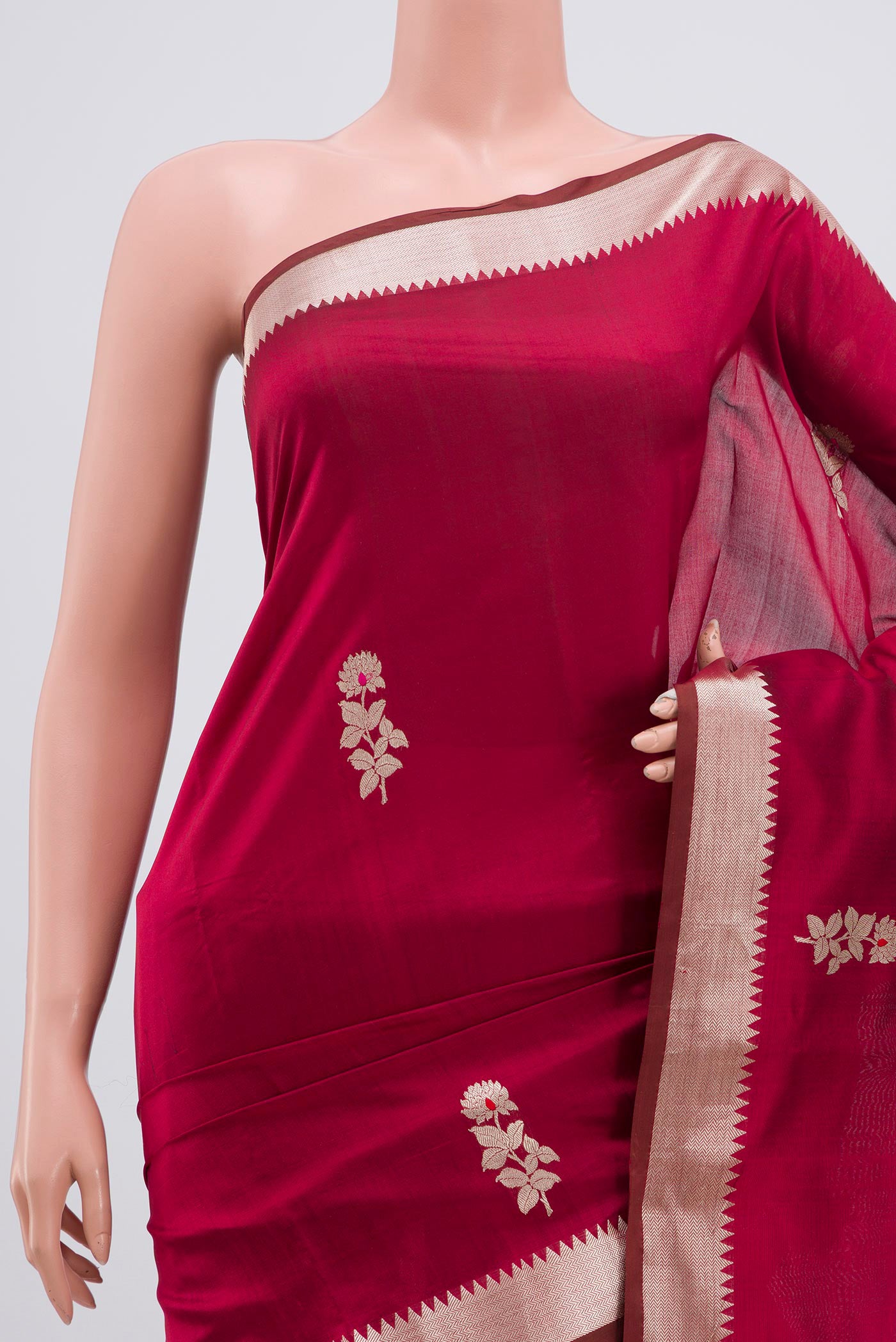 Border image of Maroon Banarasi Katan Silk Saree with Zari Butta on the body and Zari Border. 