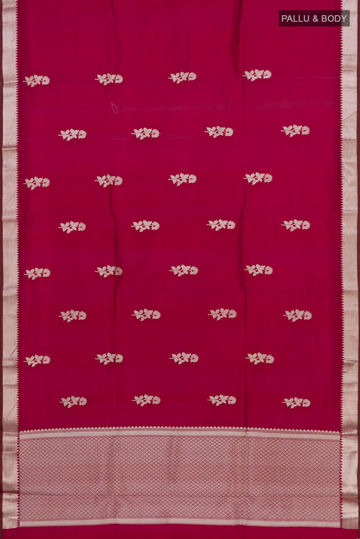 Flat view of Maroon Banarasi Katan Silk Saree with Zari Butta on the body and Zari Border. 