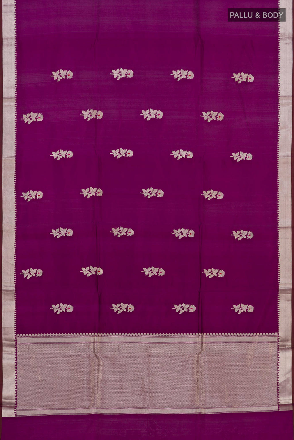 Flat view of Purple Banarasi Katan Silk Saree with Zari Butta on the body and Zari Border. 