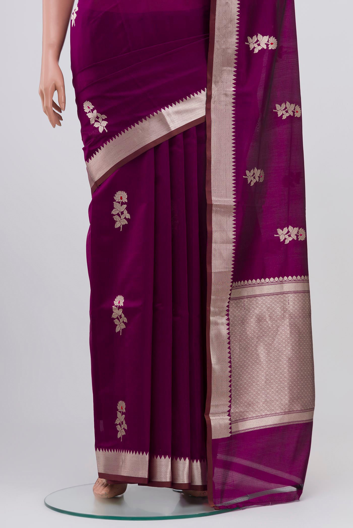 Pleats and pallu of Purple Banarasi Katan Silk Saree with Zari Butta on the body and Zari Border. 