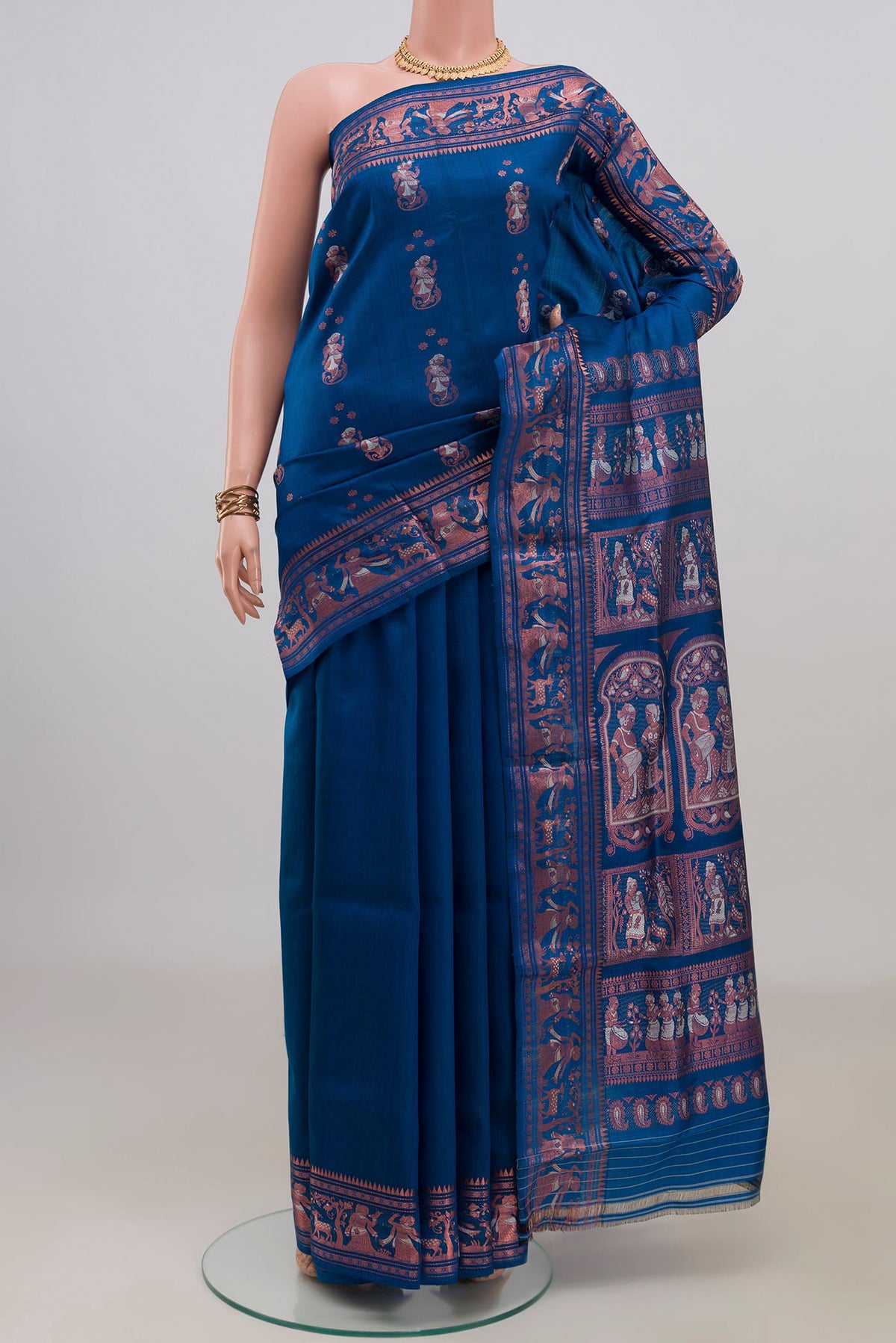 Pure Silk Blue Baluchari Saree with Zari Butta on the body and Zari Border.  displayed on a mannequin