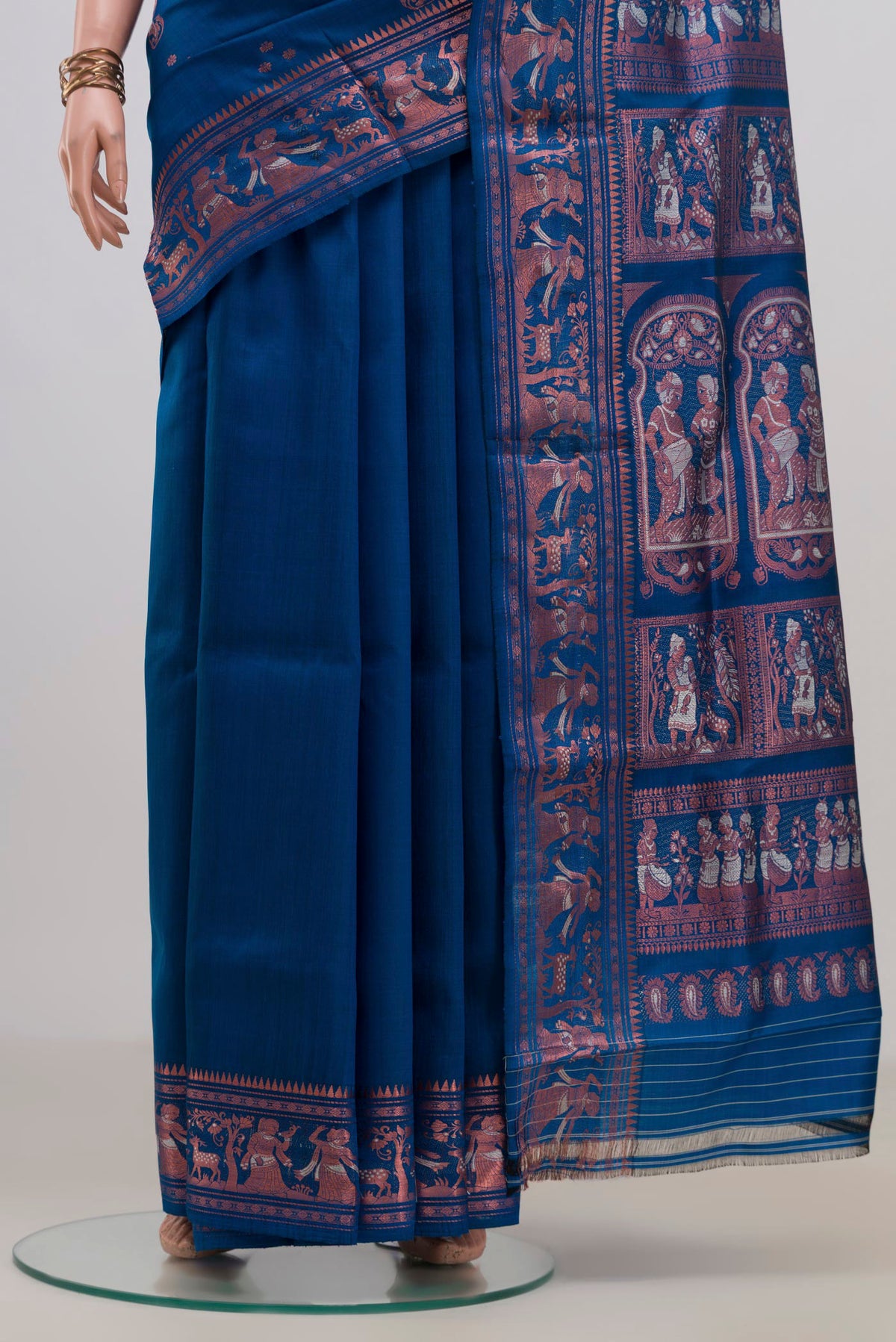 Pleats and pallu of Pure Silk Blue Baluchari Saree with Zari Butta on the body and Zari Border. 
