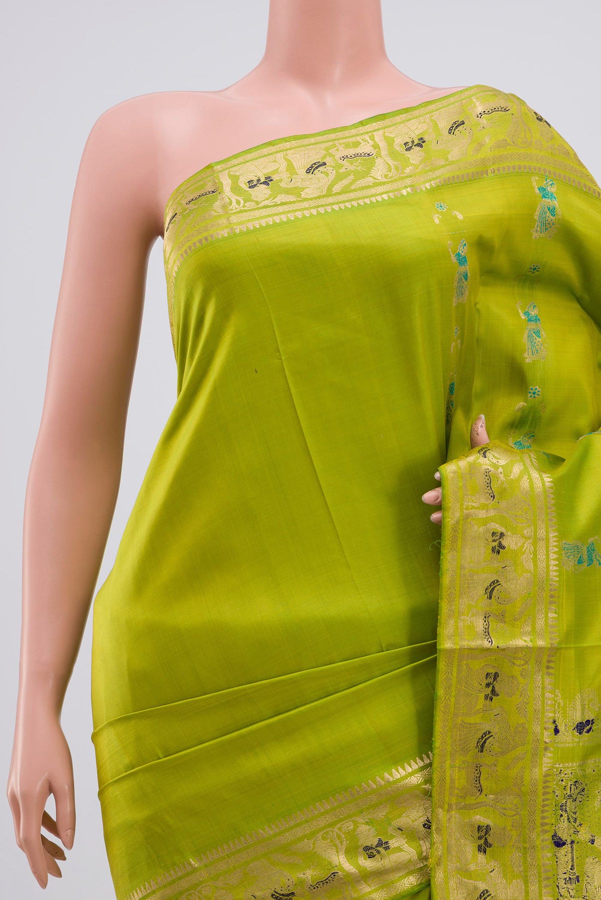 Border image of Green Baluchari Silk Saree with Zari Butta on the body and Zari Border. 