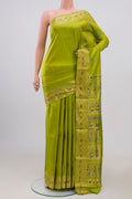 Green Baluchari Silk Saree with Zari Butta on the body and Zari Border.  displayed on a mannequin