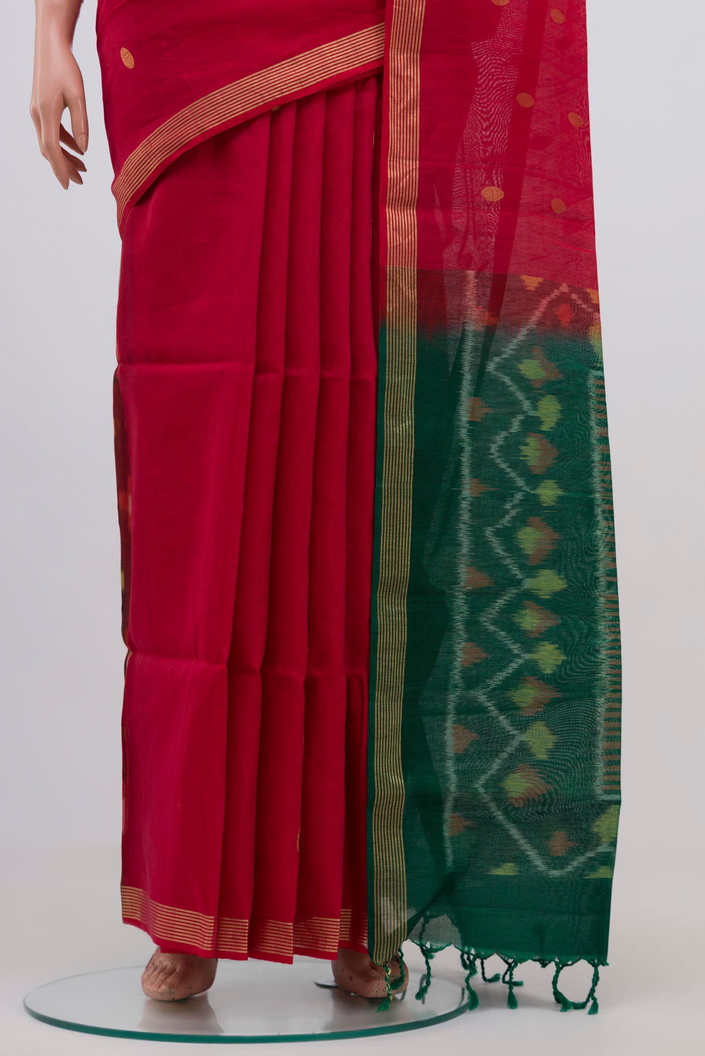 Pleats and pallu of Red Coimbatore Silk Cotton Saree with Zari Butta on the body and Zari Border. 