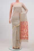 Cream Soft Silk Saree with Zari Butta on the body and Thin Zari Line.  displayed on a mannequin