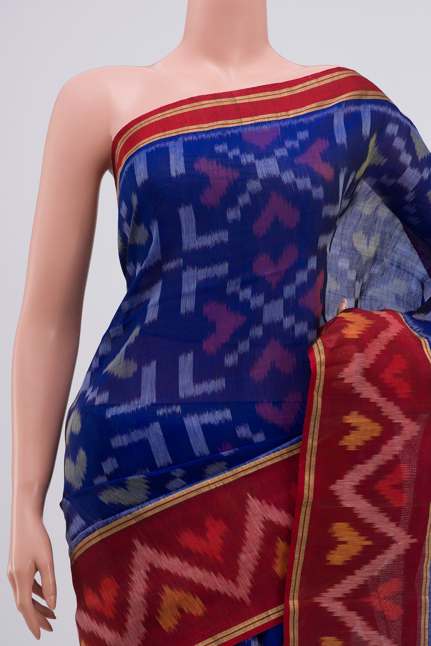 Border image of Blue Coimbatore Silk Cotton Saree with Ikat Print on the body and Zari Border. 