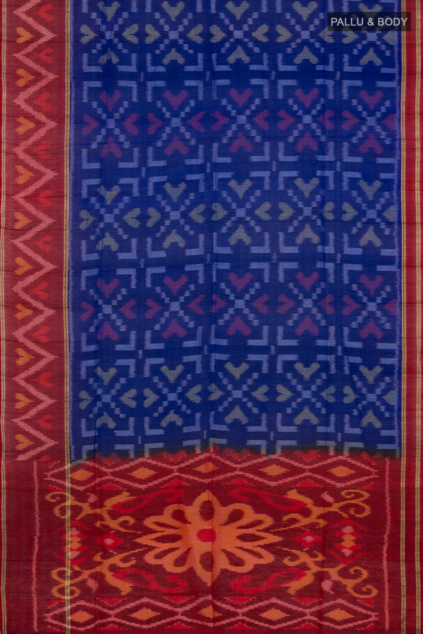 Flat view of Blue Coimbatore Silk Cotton Saree with Ikat Print on the body and Zari Border. 