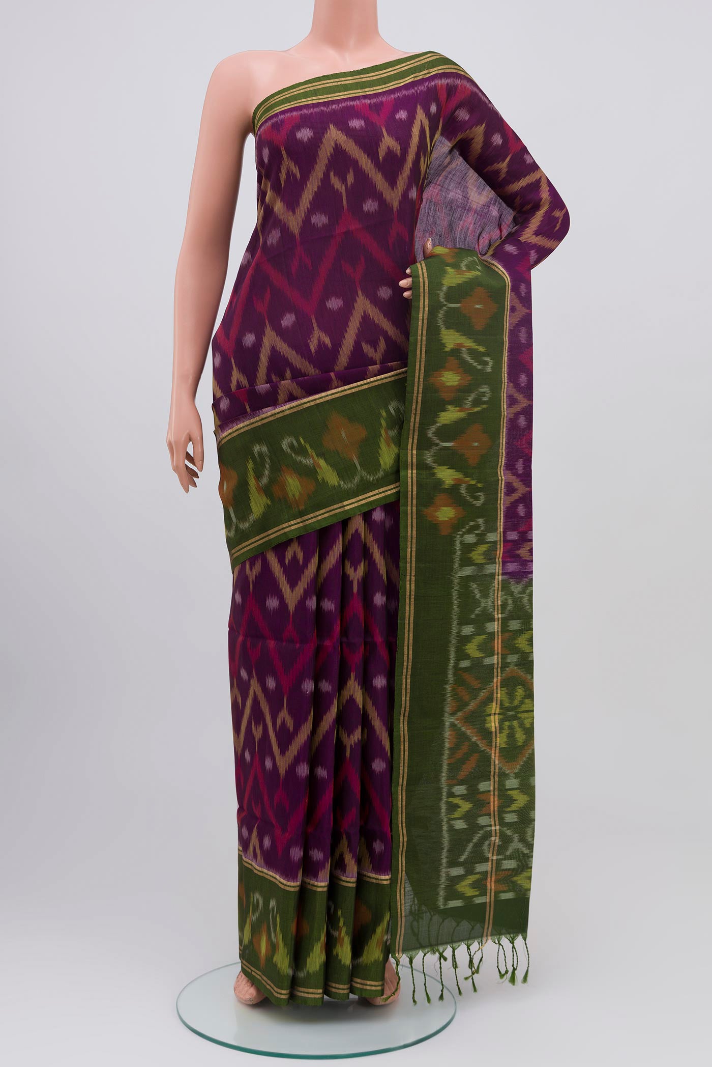 Purple Soft Silk Saree with Ikat Print on the body and Ikat Border.  displayed on a mannequin