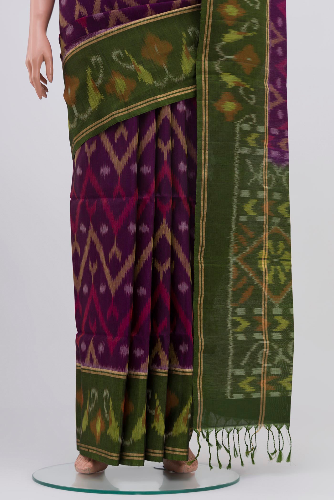 Pleats and pallu of Purple Soft Silk Saree with Ikat Print on the body and Ikat Border. 