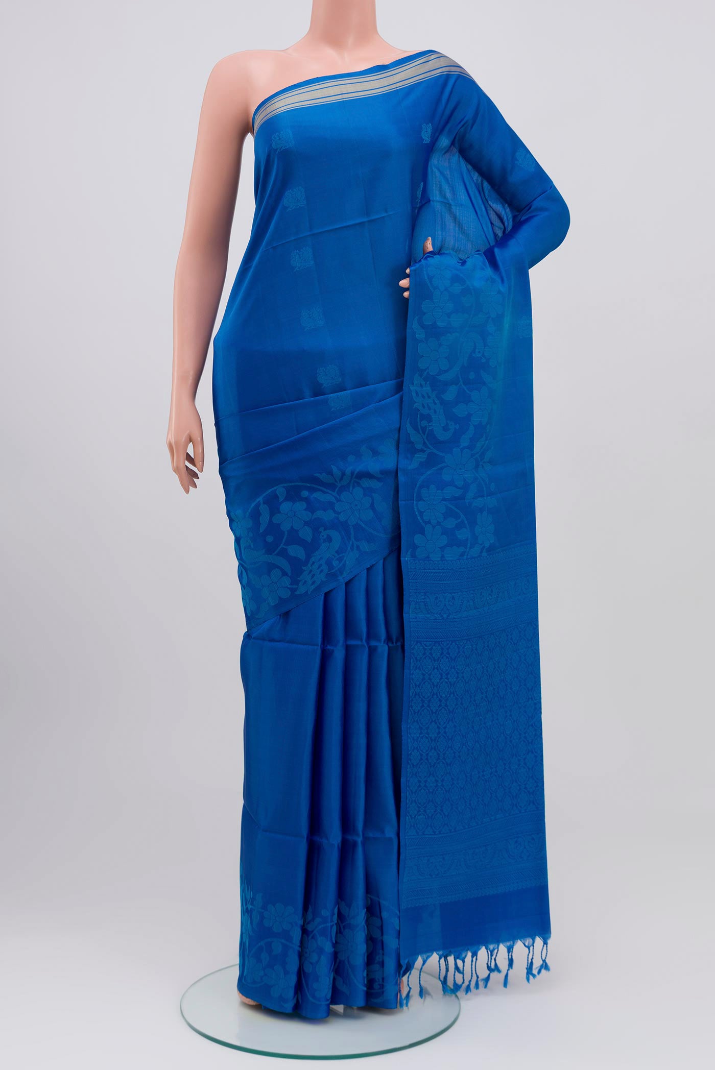 Blue Soft Silk Saree with Thread Butta on the body and Thread Border.  displayed on a mannequin