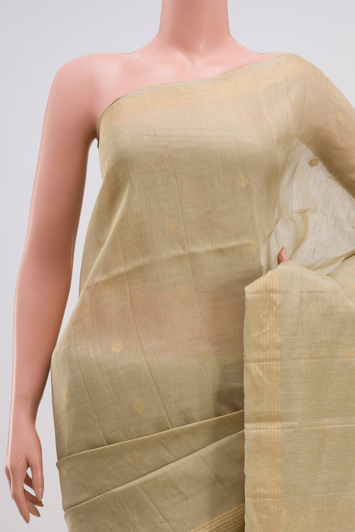 Border image of Beige Soft Silk Saree with Zari Butta on the body and Thin Zari Line. 
