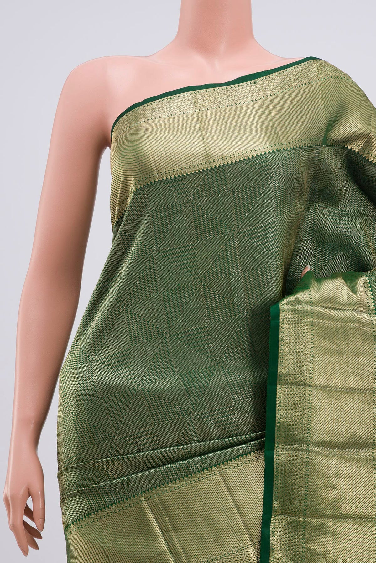 Border image of Green Kanchipuram Saree with Zari Brocade on the body and Zari Border. 