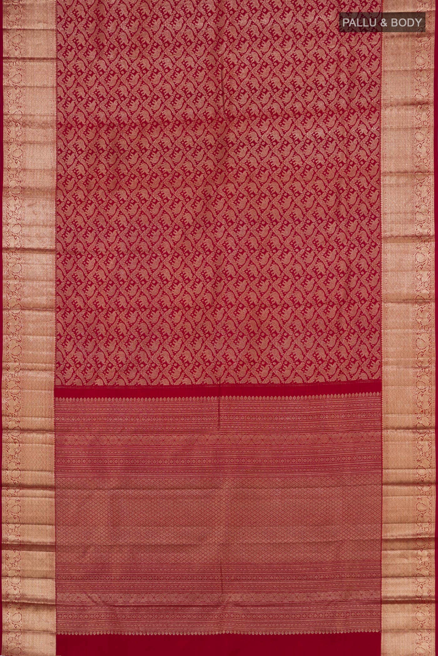 Flat view of Maroon Kanchipuram Silk Saree with Zari Brocade on the body and Zari Border. 