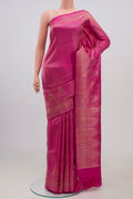 Pink Kanchipuram Silk Saree with Thread Brocade on the body and Zari Border.  displayed on a mannequin