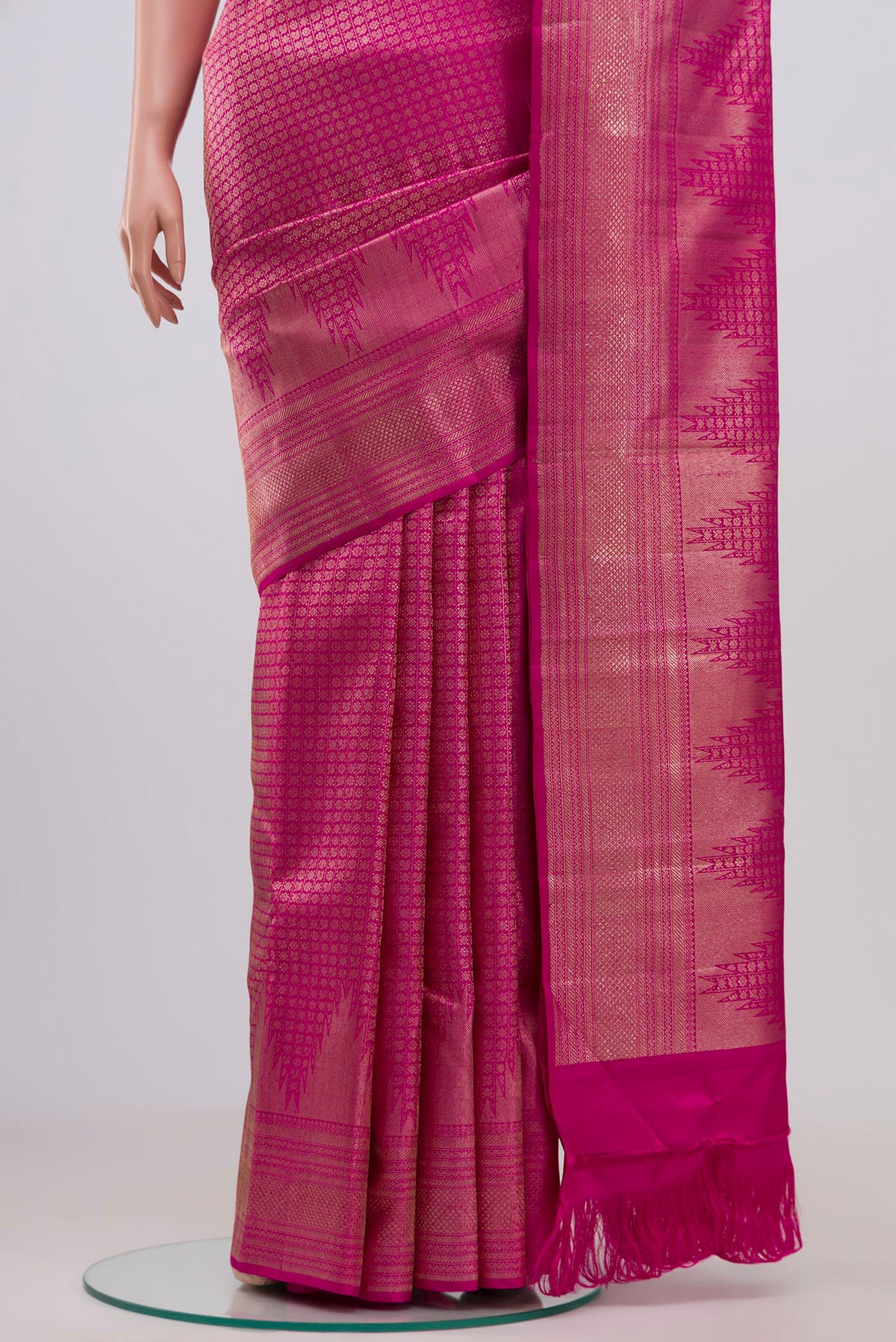 Pleats and pallu of Pink Kanchipuram Silk Saree with Thread Brocade on the body and Zari Border. 