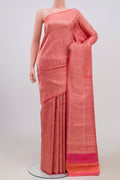 Pink Kanchipuram Saree with Zari Brocade on the body and Zari Border.  displayed on a mannequin