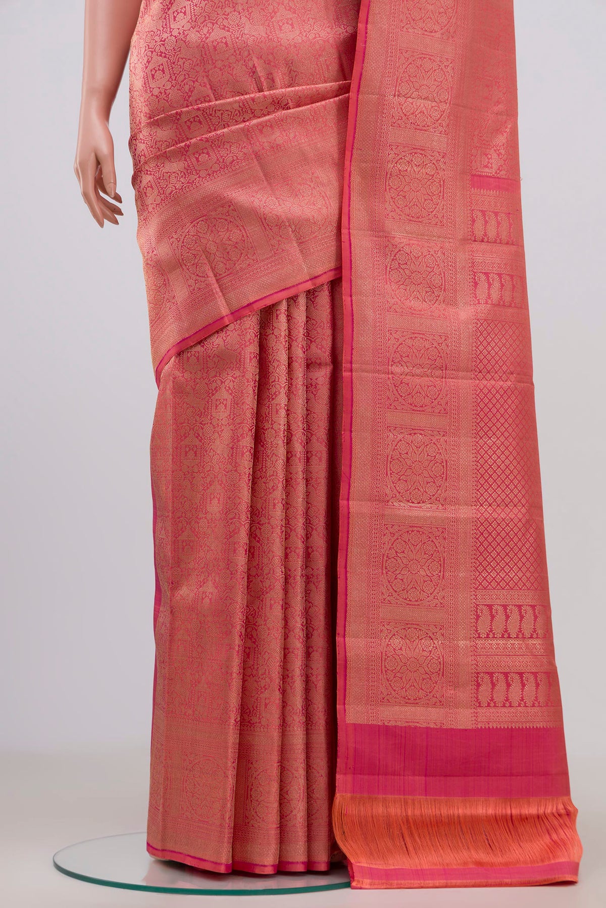 Pleats and pallu of Pink Kanchipuram Saree with Zari Brocade on the body and Zari Border. 