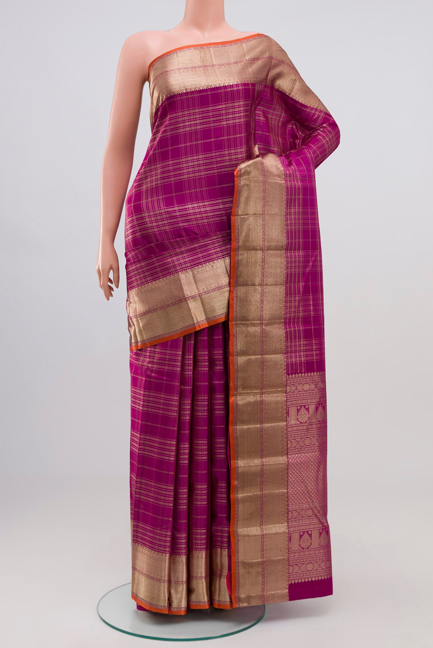 Purple Kanchipuram Silk Saree with Checked design on the body and Zari Border.  displayed on a mannequin
