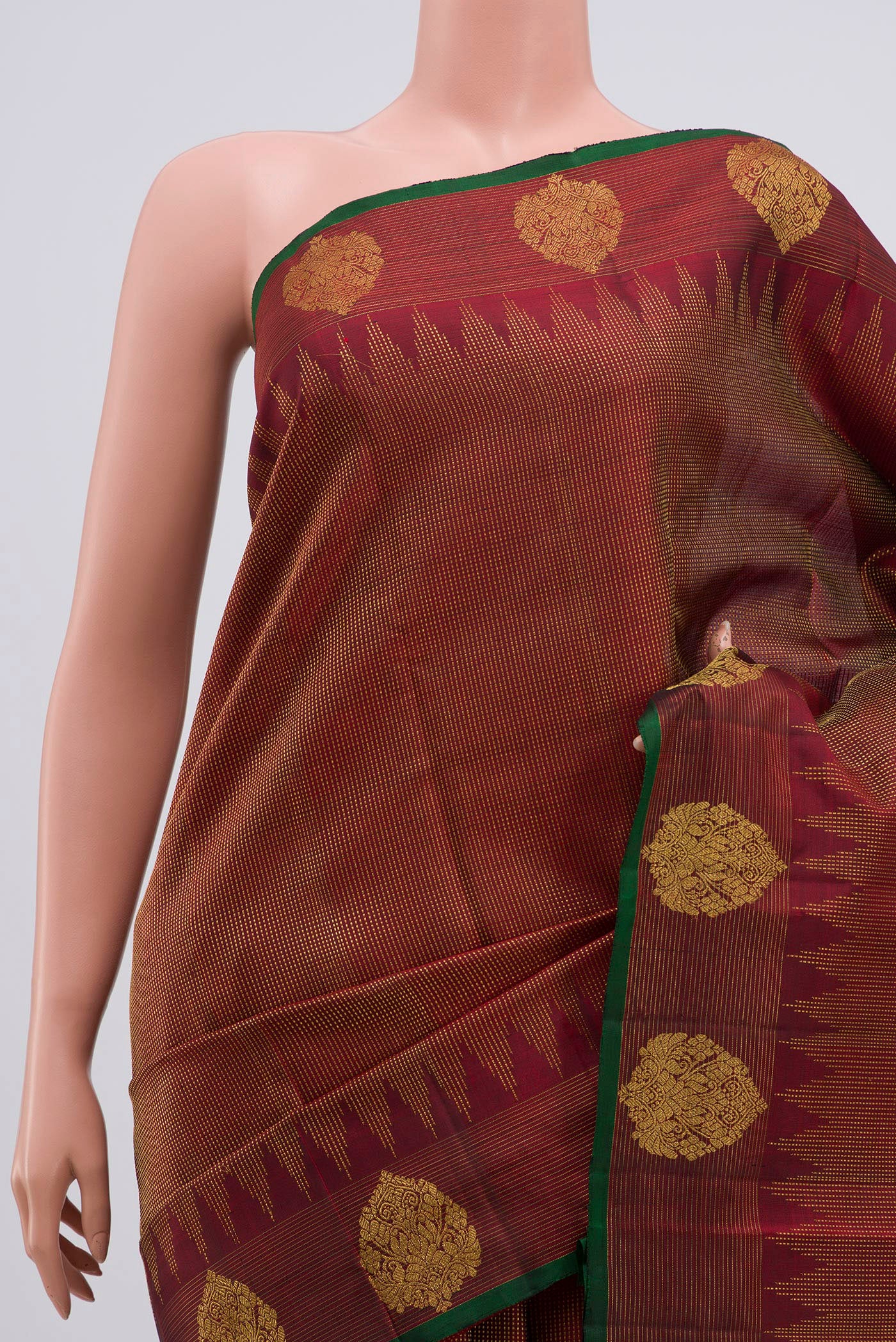 Border image of Maroon Kanjivaram Silk Saree with Zari Brocade on the body and Zari Border. 