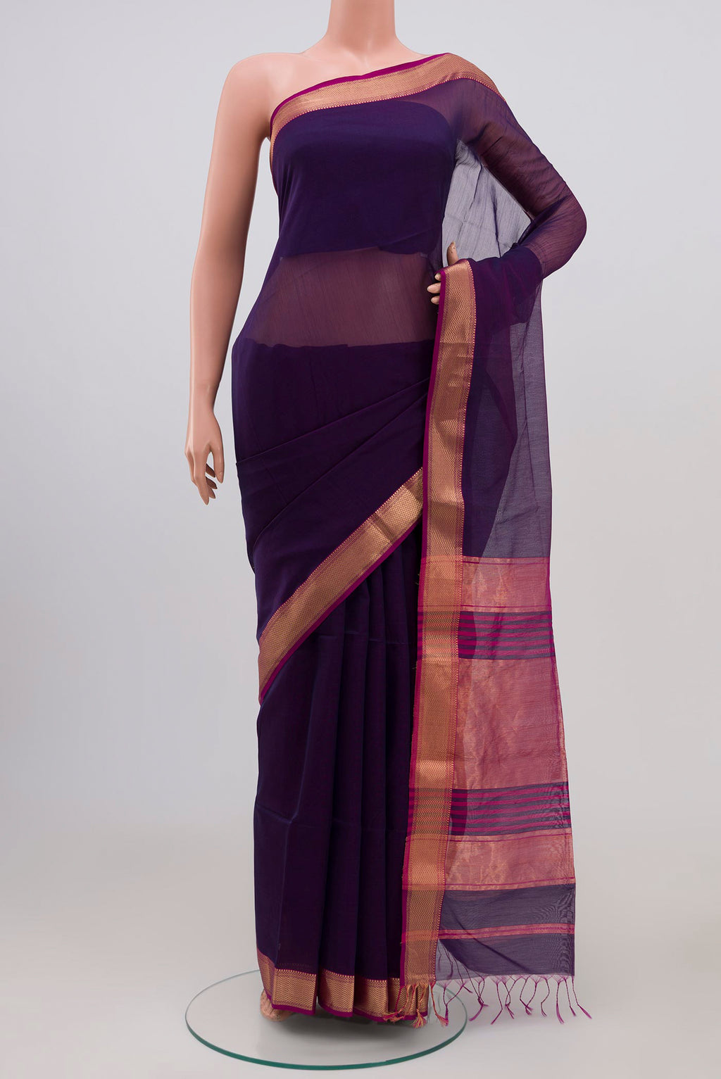 Blue Maheshwari Silk Cotton Saree with Plain Body and Zari Border.  displayed on a mannequin