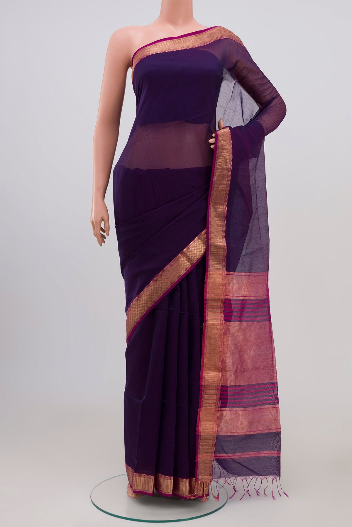 Blue Maheshwari Silk Cotton Saree with Plain Body and Zari Border.  displayed on a mannequin