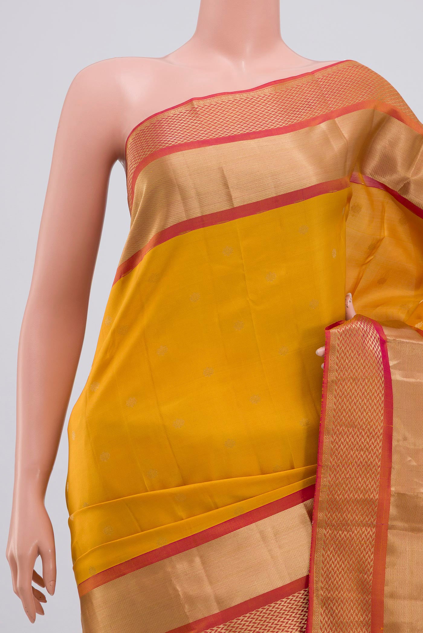 Border image of Yellow Kanchipuram Saree with Zari Butta on the body and Zari Border. 