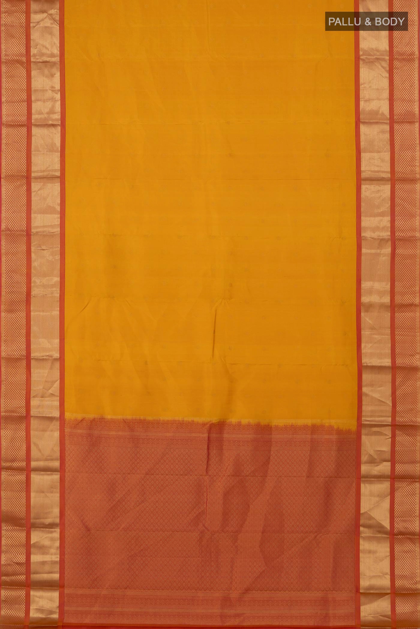 Flat view of Yellow Kanchipuram Saree with Zari Butta on the body and Zari Border. 