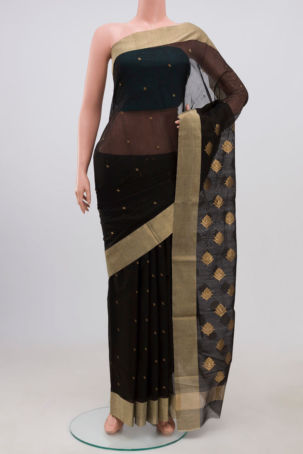 Black Chanderi Silk Cotton Saree with Zari Butta on the body and Zari Border.  displayed on a mannequin