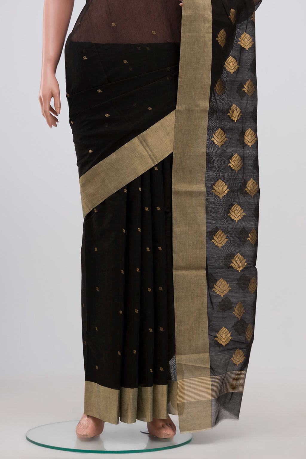 Pleats and pallu of Black Chanderi Silk Cotton Saree with Zari Butta on the body and Zari Border. 