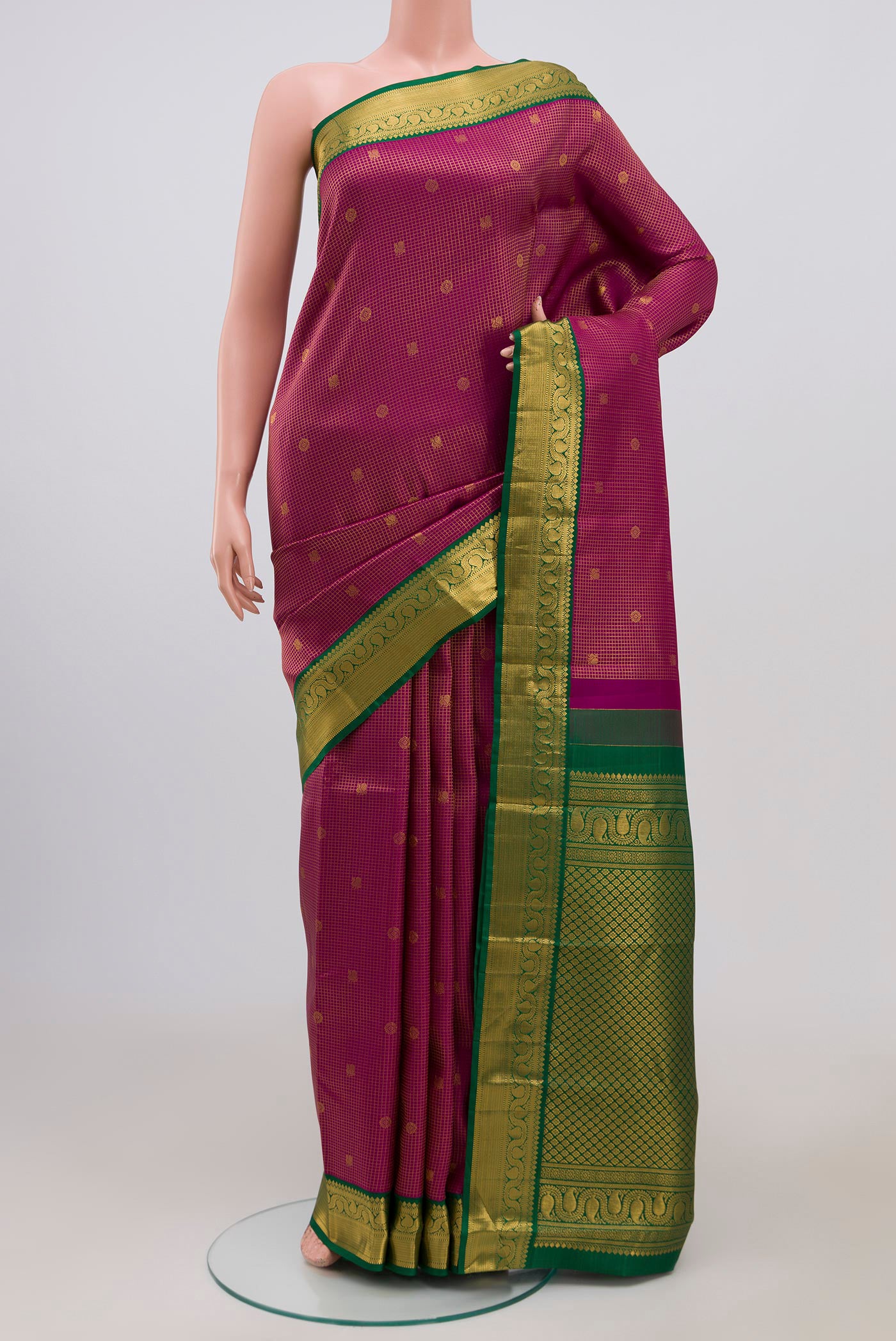 Purple Kanjivaram Saree with Checked design on the body and Zari Border.  displayed on a mannequin