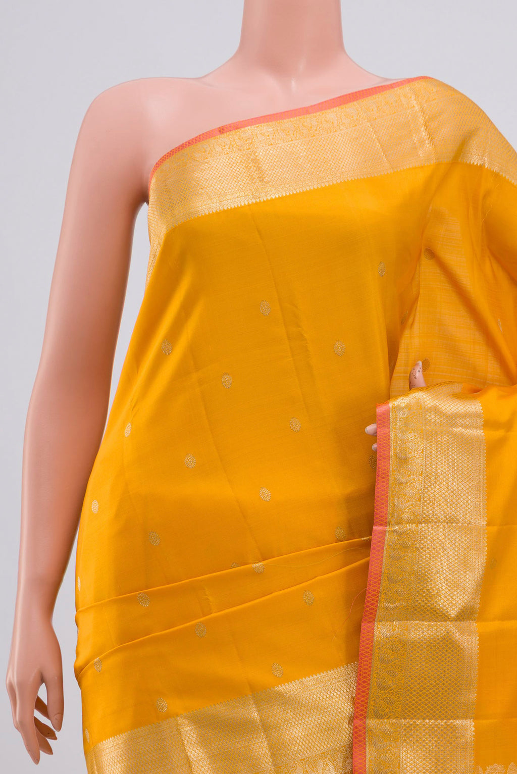 Border image of Yellow Kanjivaram Saree with Zari Butta on the body and Zari Border. 