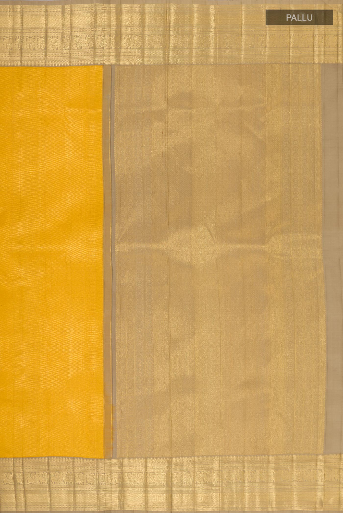 Close up image of the pallu of Yellow Kanchipuram Saree with Zari Brocade on the body and Zari Border. 