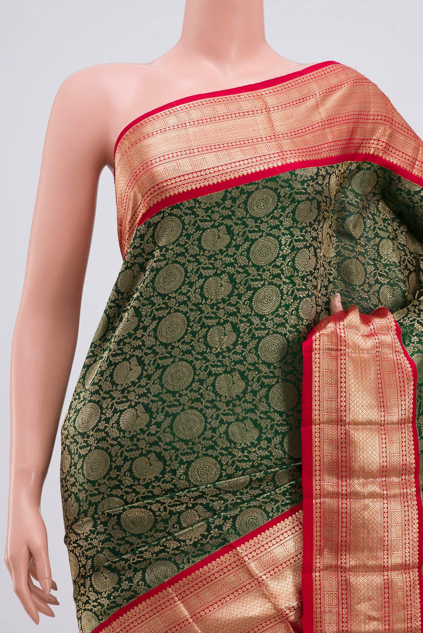 Border image of Bottle Green Kanchipuram Saree with Zari Brocade on the body and Zari Border. 