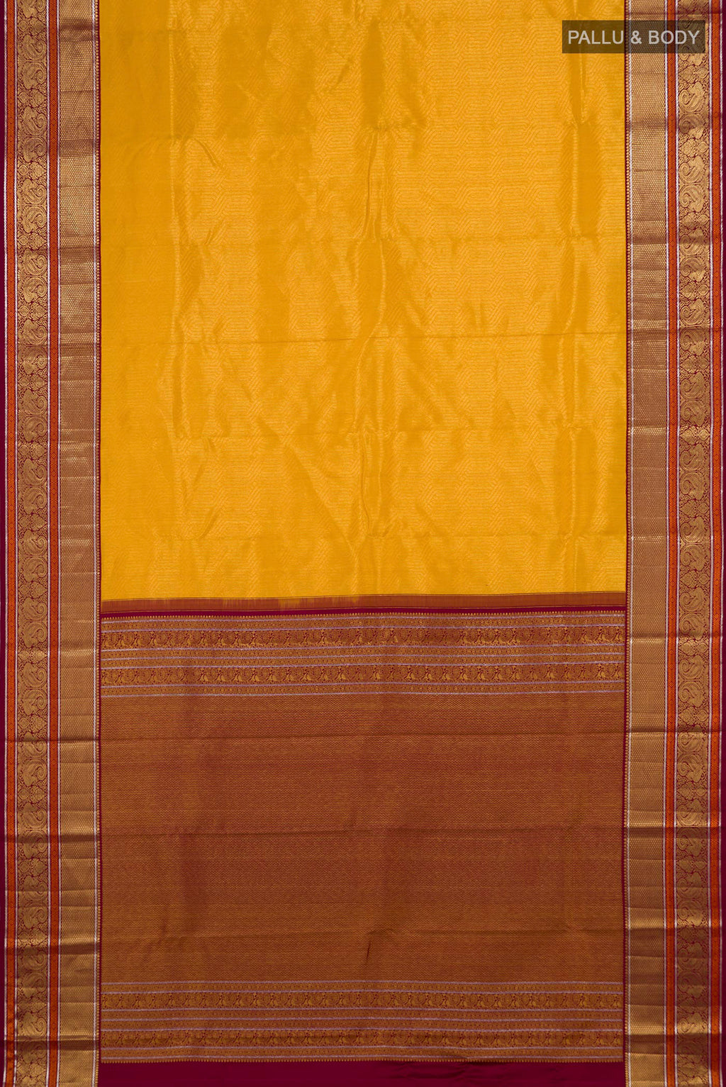 Flat view of Yellow Kanchipuram Silk Saree with Zari Brocade on the body and Zari Border. 
