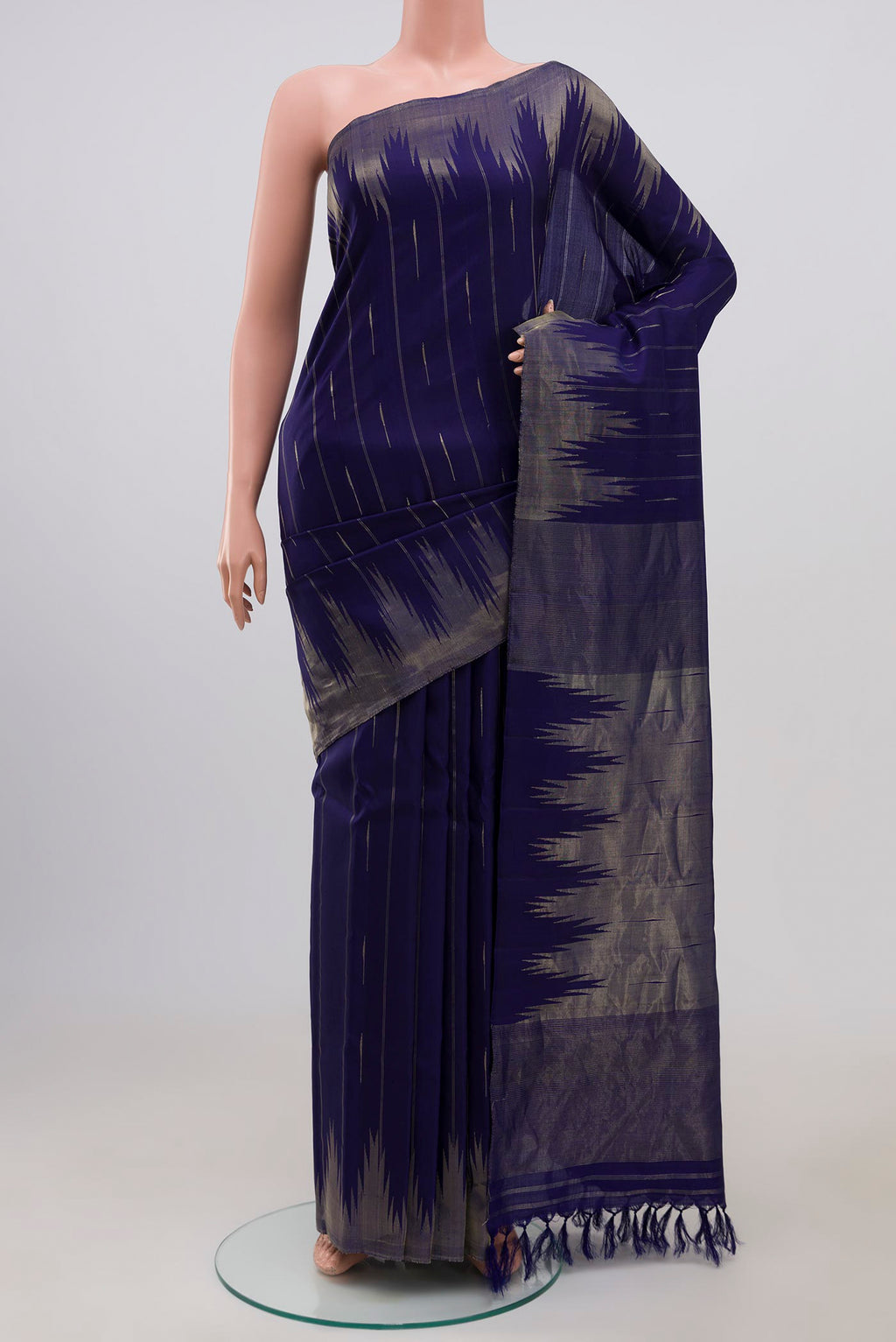 Blue Gadwal Silk Saree with Zari Butta on the body and Temple Border.  displayed on a mannequin