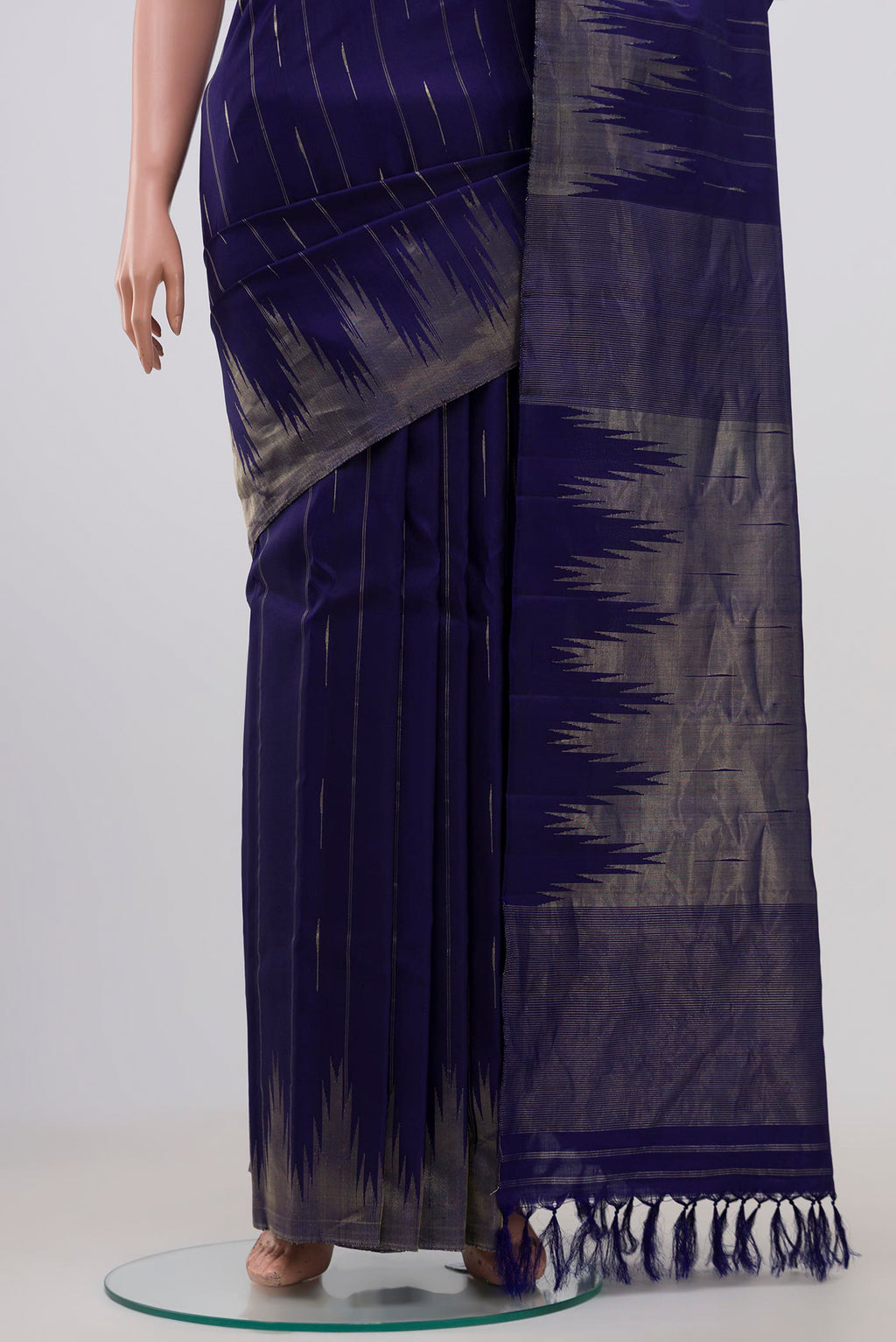 Pleats and pallu of Blue Gadwal Silk Saree with Zari Butta on the body and Temple Border. 