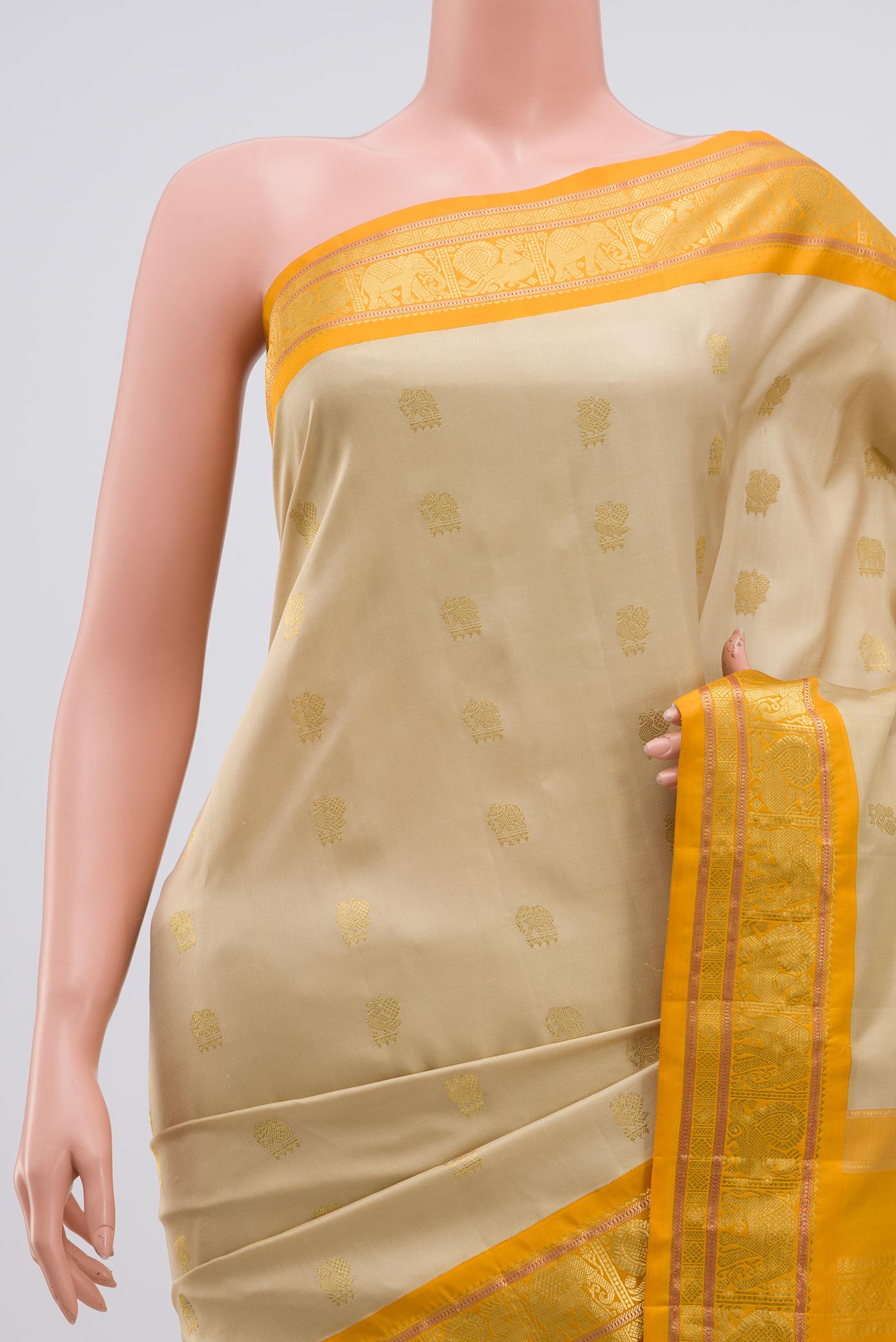 Border image of Cream Gadwal Silk Saree with Zari Butta on the body and Zari Border. 
