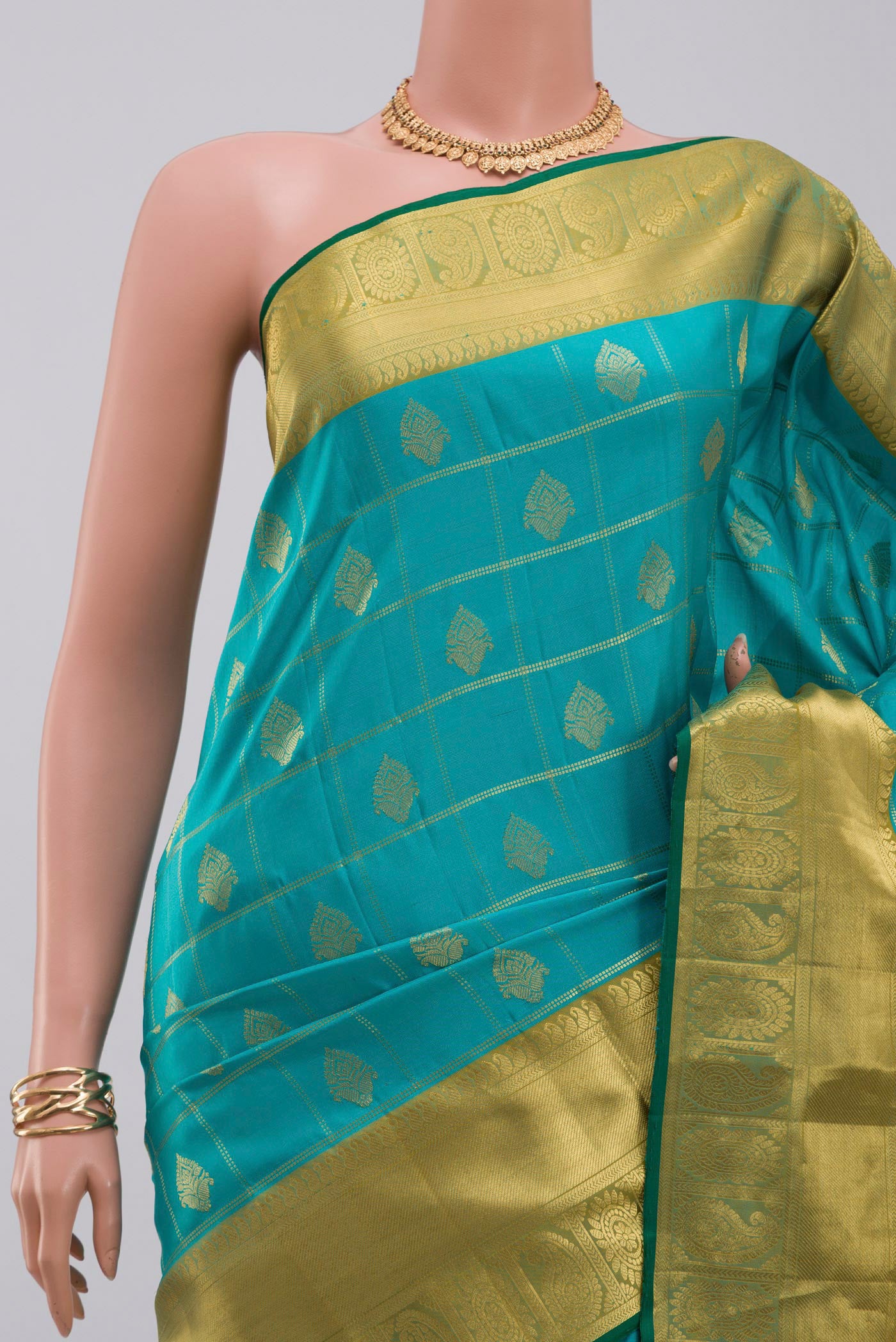 Border image of Blue Gadwal Silk Saree with Checked design on the body and Zari Border. 